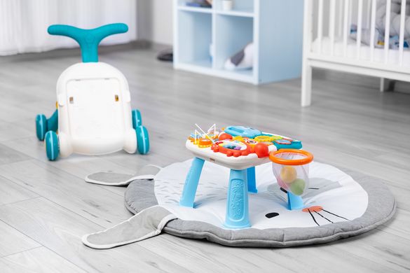 Ходунки-каталка игровой развивающий столик 2 в 1 Caretero Spark Turquoise