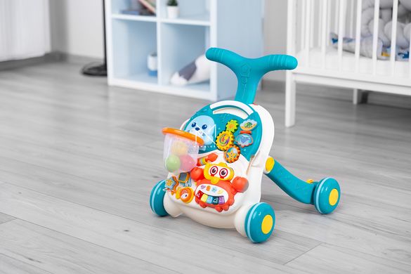 Ходунки-каталка игровой развивающий столик 2 в 1 Caretero Spark Turquoise