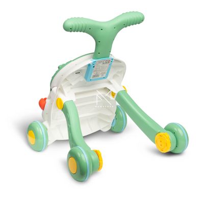 Ходунки-каталка ігровий розвиваючий столик  2 в 1 Caretero Spark Green