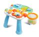 Ходунки-каталка игровой развивающий столик 2 в 1 Caretero Spark Green